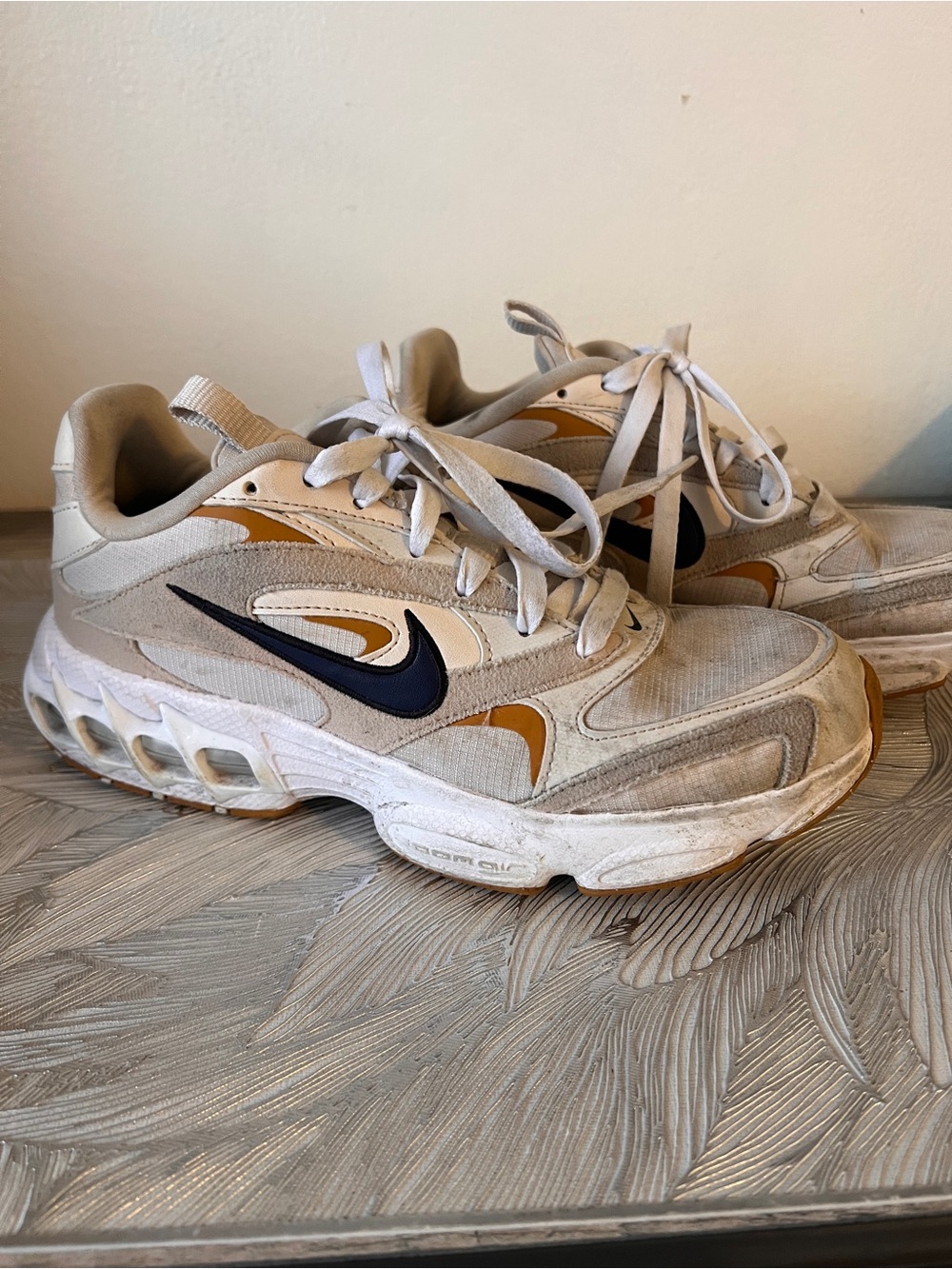 Nike beige tan navy athletic sneakers